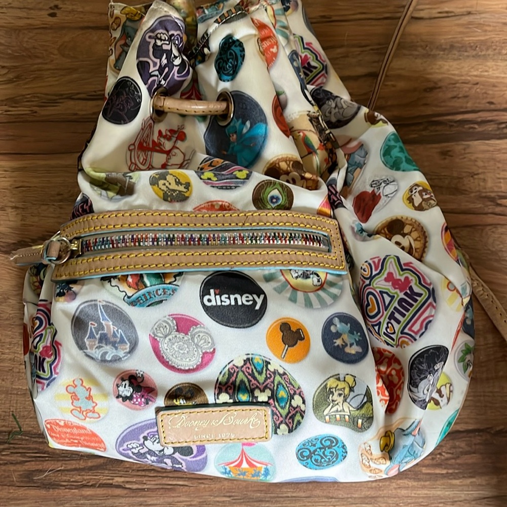 Disney Dooney and Bourke Disney pins backpack purse